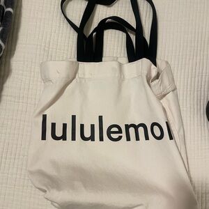 Lululemon Cream Tote with Black Handles